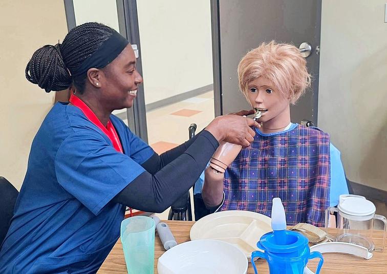 A PSW student learning care skills during healthcare training A PSW student learning care skills during healthcare training