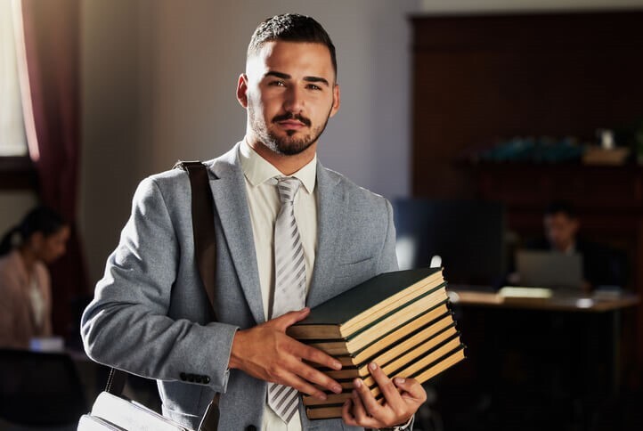 A law student studying after paralegal training