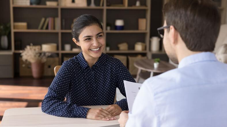 A personal support worker answering interview questions for personal support workers confidently during a job interview.