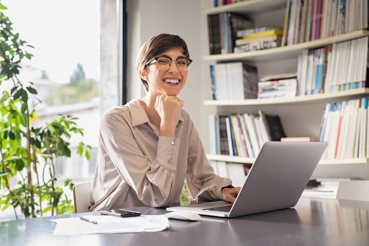 An independent paralegal working in a home office after career training