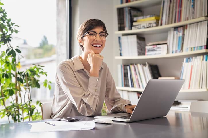 An independent paralegal working in a home office after career training