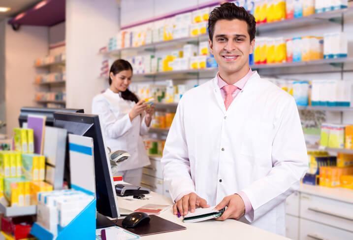 A smiling pharmacy assistant training grad posing for a photo