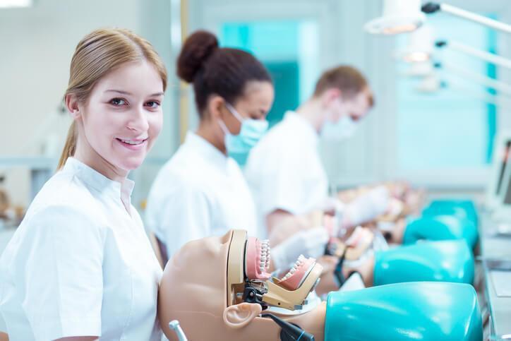 A student gaining confidence during hands-on training at our career college in Ontario