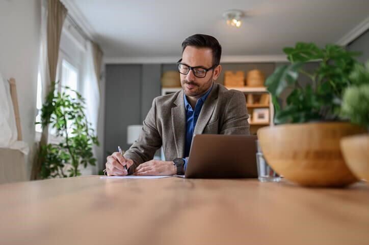 A prospective paralegal filling out documents after completing his paralegal program