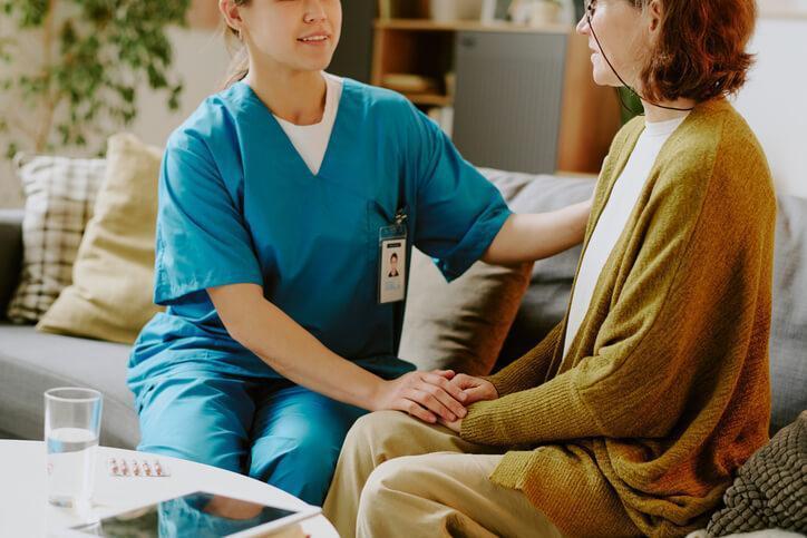 A personal support worker demonstrating emotional intelligence during patient care